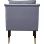 Fauteuil d'appoint en velours avec pieds en bois noir et embouts dorés, design contemporain