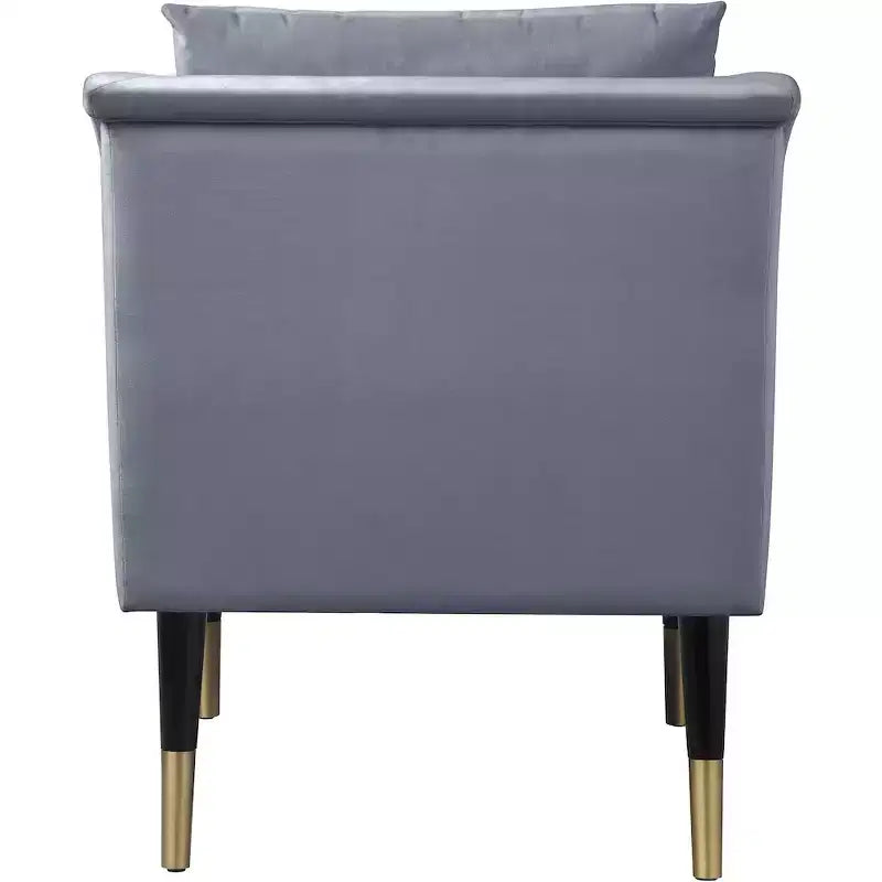 Fauteuil d'appoint en velours avec pieds en bois noir et embouts dorés, design contemporain