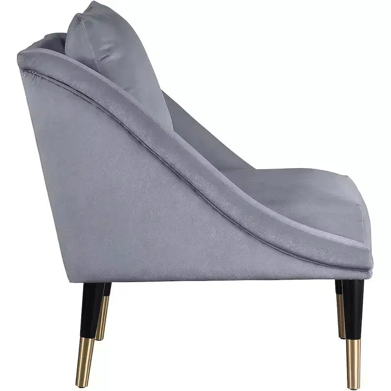 Fauteuil d'appoint en velours avec pieds en bois noir et embouts dorés, design contemporain